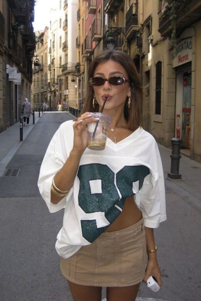 white football jersey + khaki mini skirt