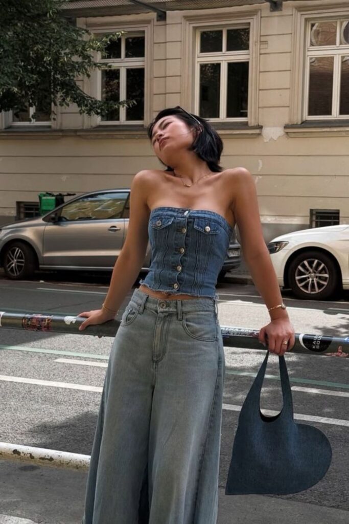 Denim on Denim Outfits Are Back and This List Proves It Was Never a Mistake bustier denim + pants and heart-shaped tote