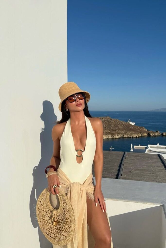 plunging halter swimsuit & straw bucket hat