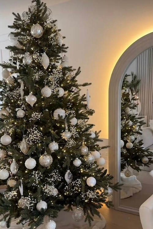 The 12 White Christmas Trees That Turn Your Home Into a Snowy Fairytale The 12 White Christmas Trees That Turn Your Home Into a Snowy Fairytale