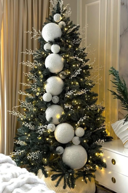 The 12 White Christmas Trees That Turn Your Home Into a Snowy Fairytale The 12 White Christmas Trees That Turn Your Home Into a Snowy Fairytale