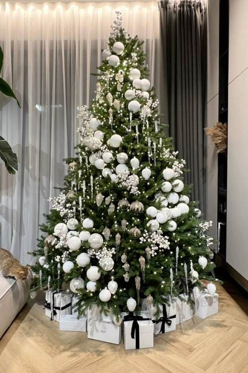 The 12 White Christmas Trees That Turn Your Home Into a Snowy Fairytale The 12 White Christmas Trees That Turn Your Home Into a Snowy Fairytale