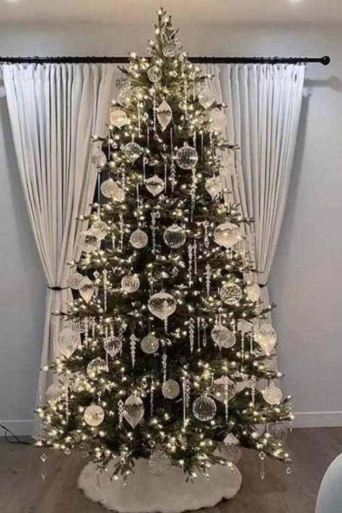 The 12 White Christmas Trees That Turn Your Home Into a Snowy Fairytale The 12 White Christmas Trees That Turn Your Home Into a Snowy Fairytale