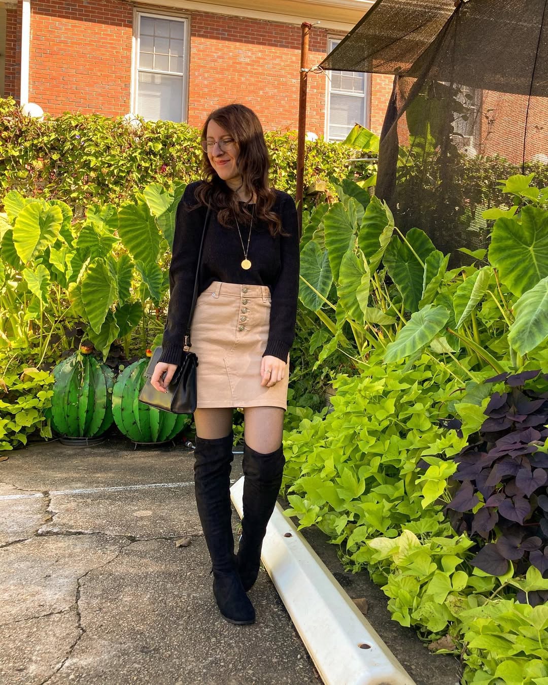 Black Sweater with Tan Button-Front Mini Skirt and Boots