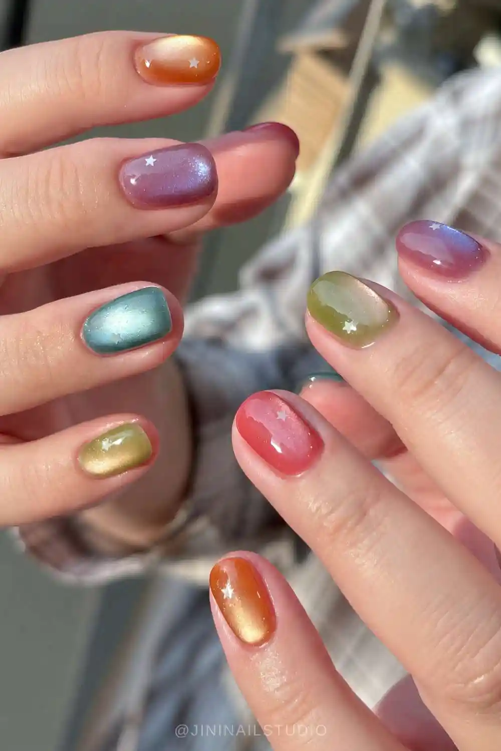 Colorful cat eye nails with micro stars