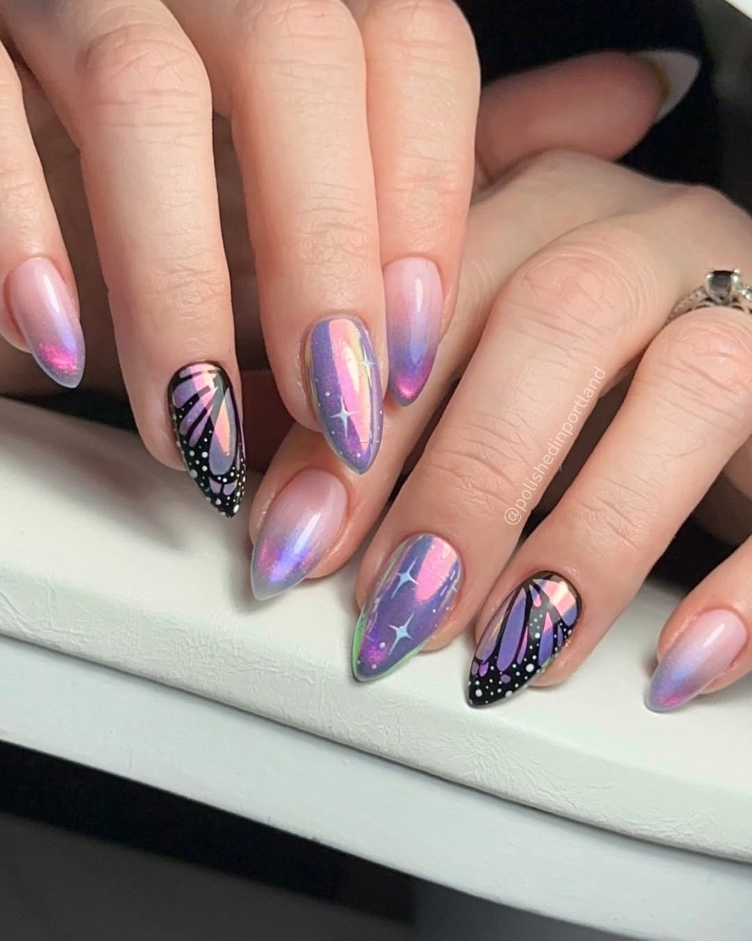 Iridescent Purple Butterfly and Starburst Stiletto Nails