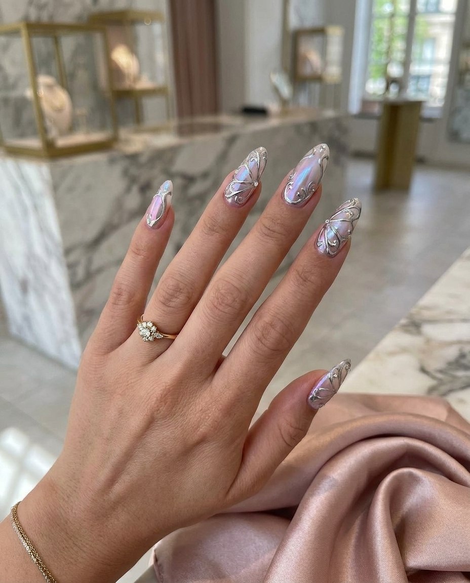 Iridescent Pink Pearl Butterfly Stiletto Nails