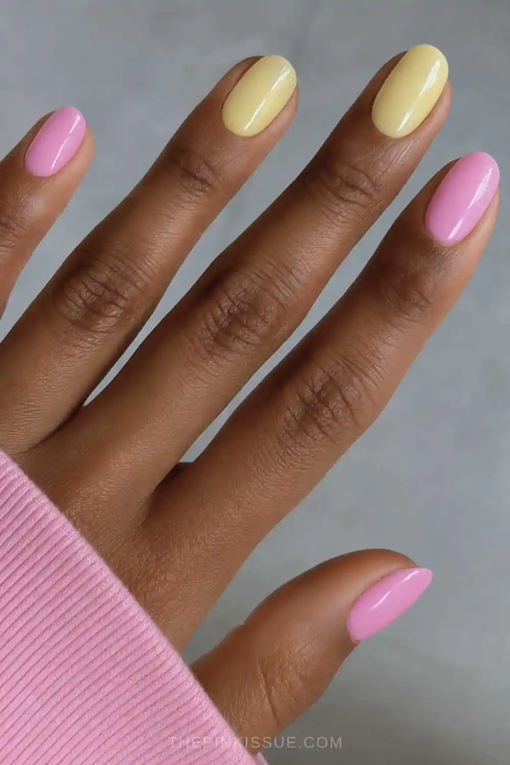 Round pink and yellow manicure