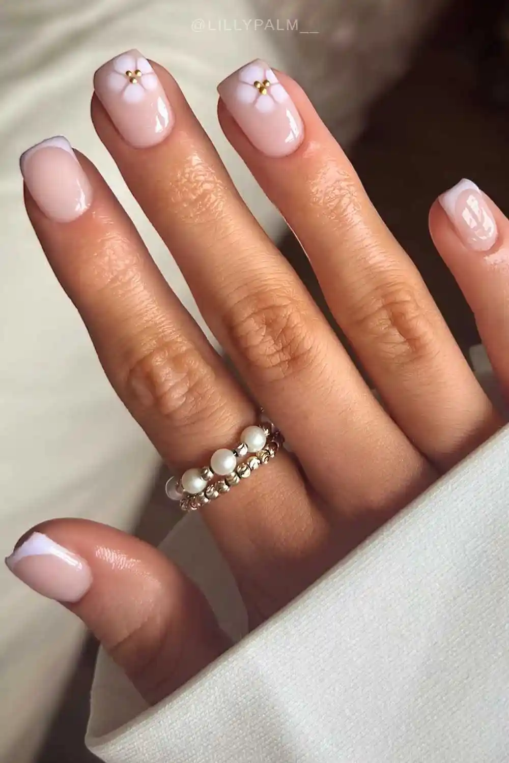 Light lavender nails with blooming gel flowers