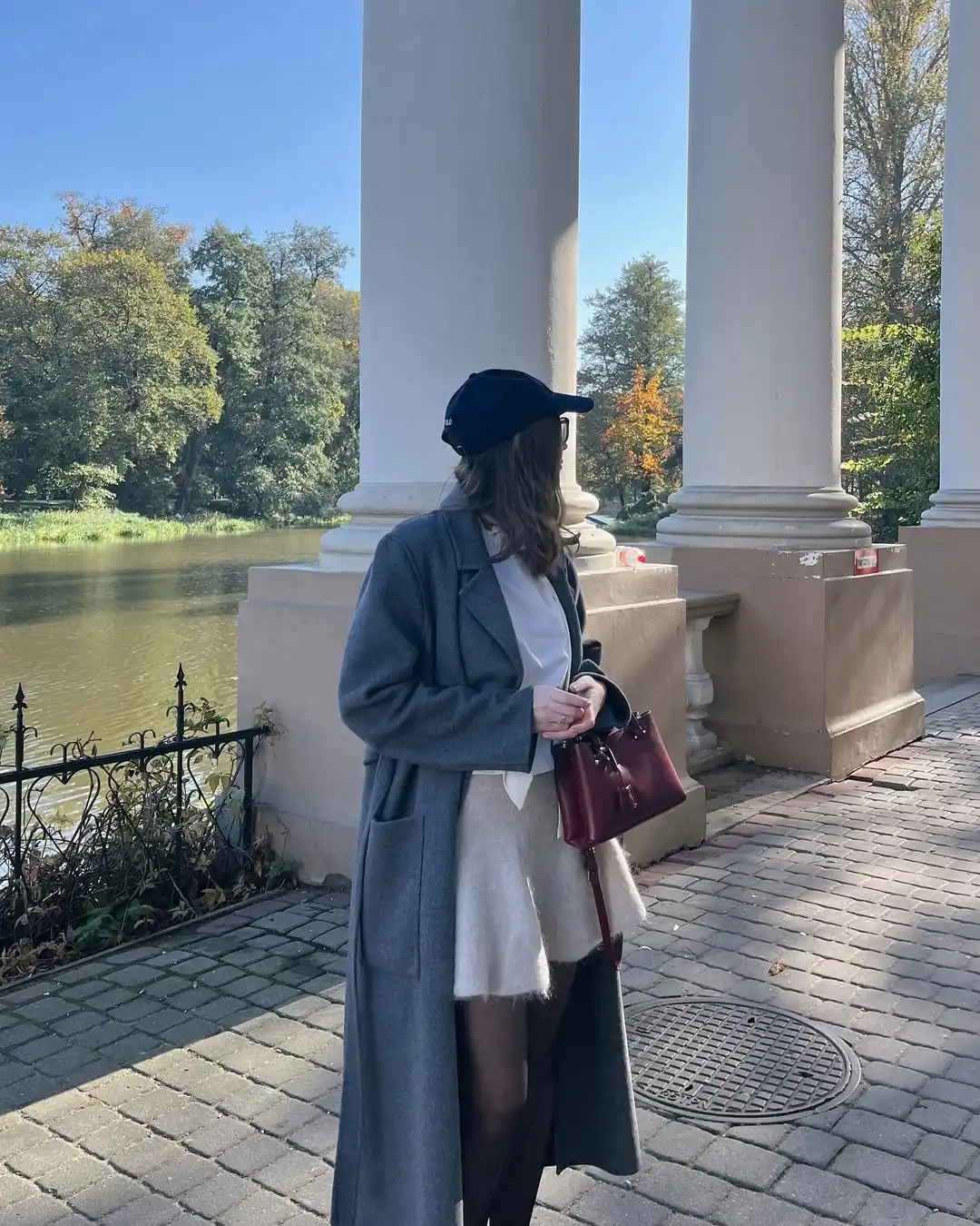 Longline Coat Over Textured Skirt Ensemble