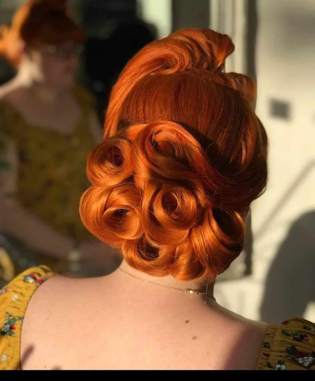 40+ Retro Hairstyles That Are Surprisingly Easy to Recreate Vintage rosettes updo