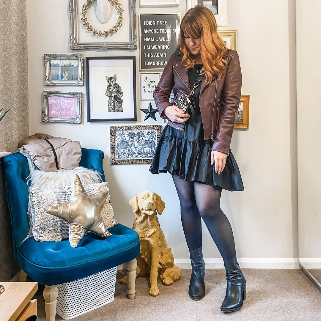 Edgy Moto Jacket Over Tiered Black Dress Look