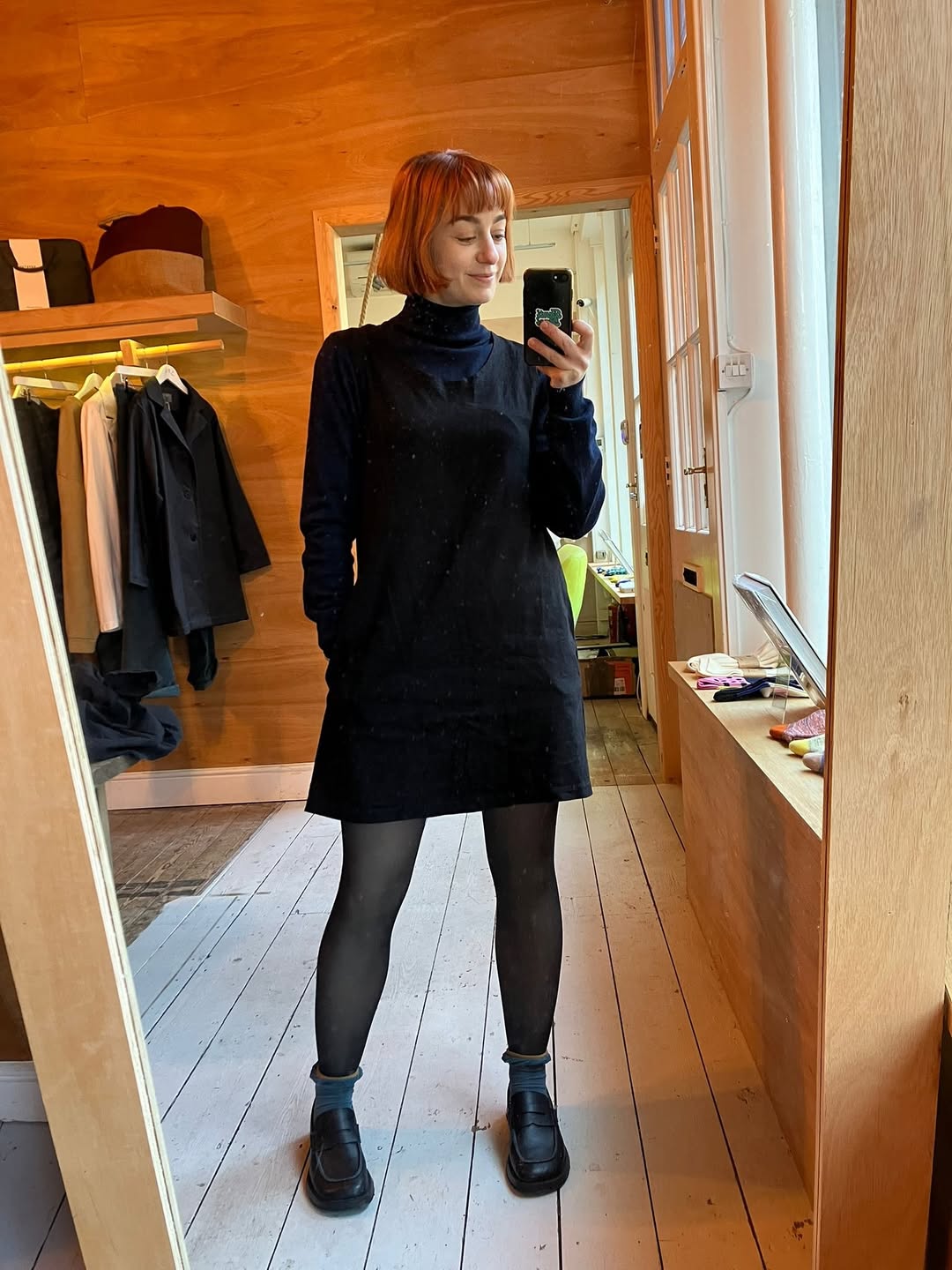Simple Black Pinafore Dress With Navy Turtleneck Layering