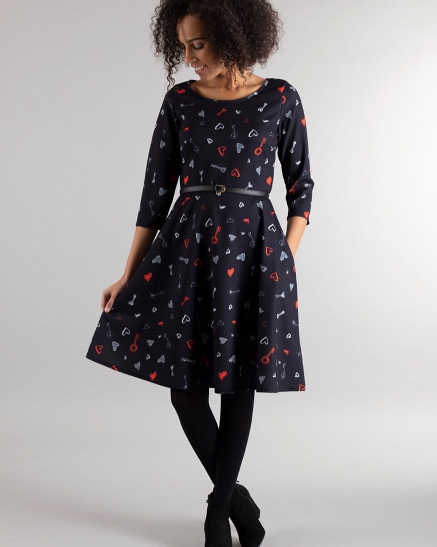 Playful Printed A-Line Dress With Black Tights and Boots