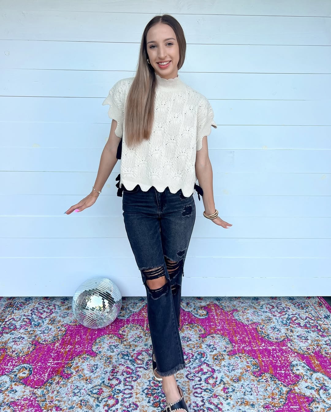 Chic Skeletal Knit Top With Ripped Jeans