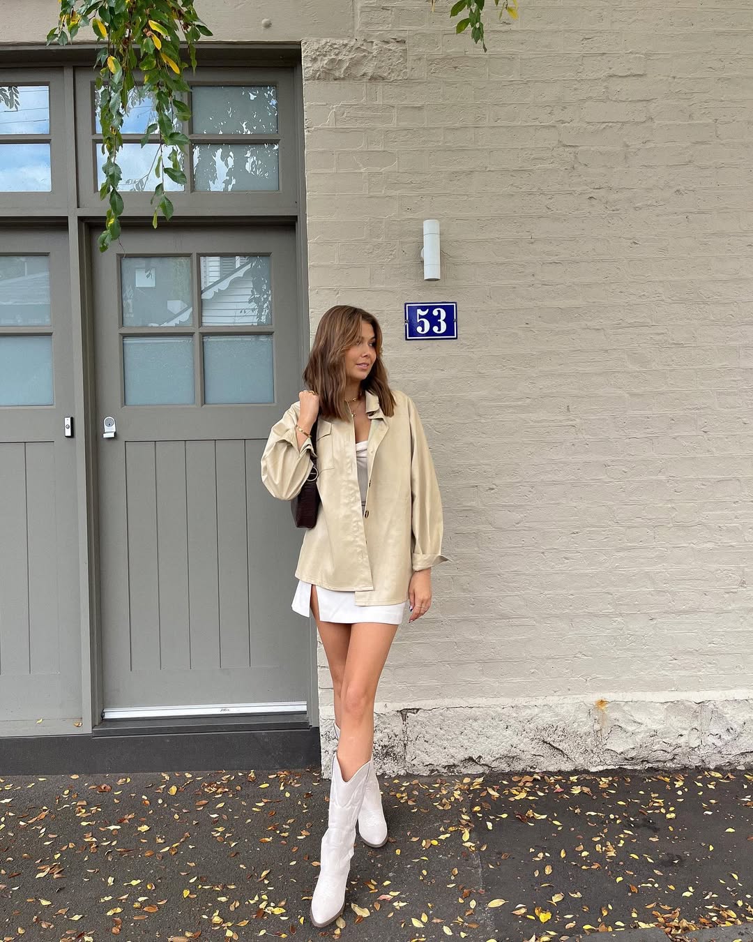Western Chic White Mini Skirt With Cowboy Boots