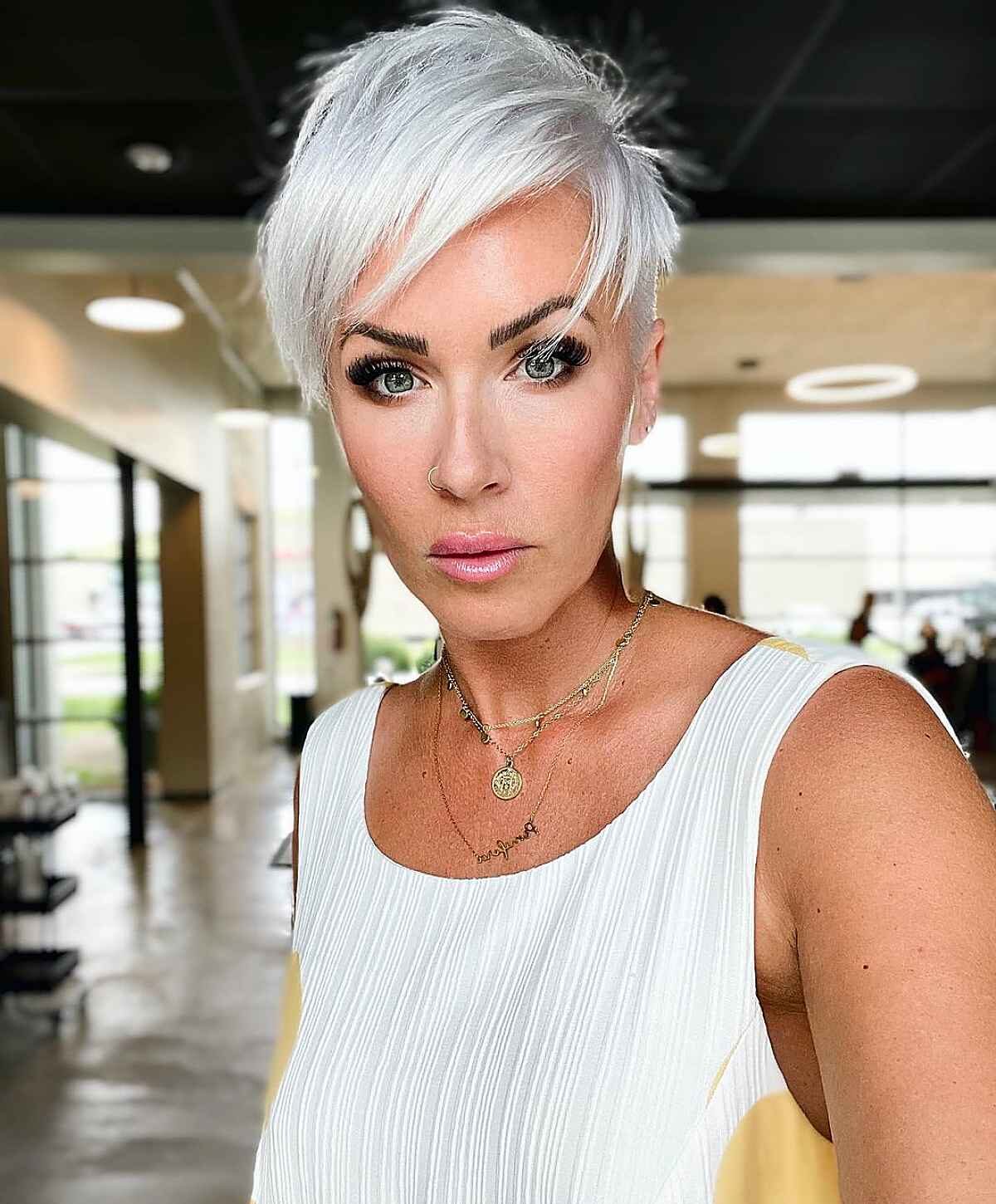 29 Short Hair Ideas with Side Bangs That Look Instantly Stylish Short Pixie Haircut with Side-Swept Bangs
