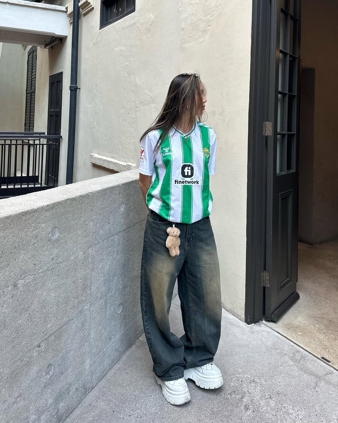 Sporty Jersey Meets Baggy Jeans Street Style