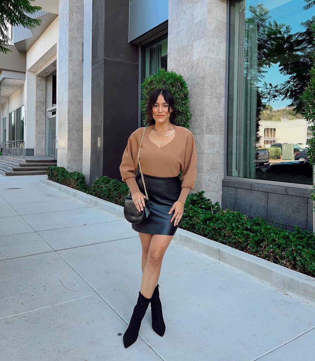 Brown Knit Top With Black Leather Mini Skirt