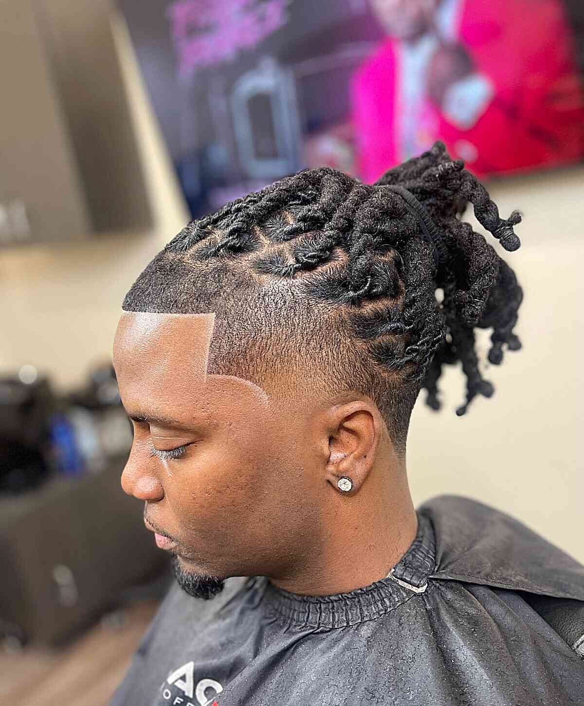 Long Man Bun with Dreads and Mid Temp Fade