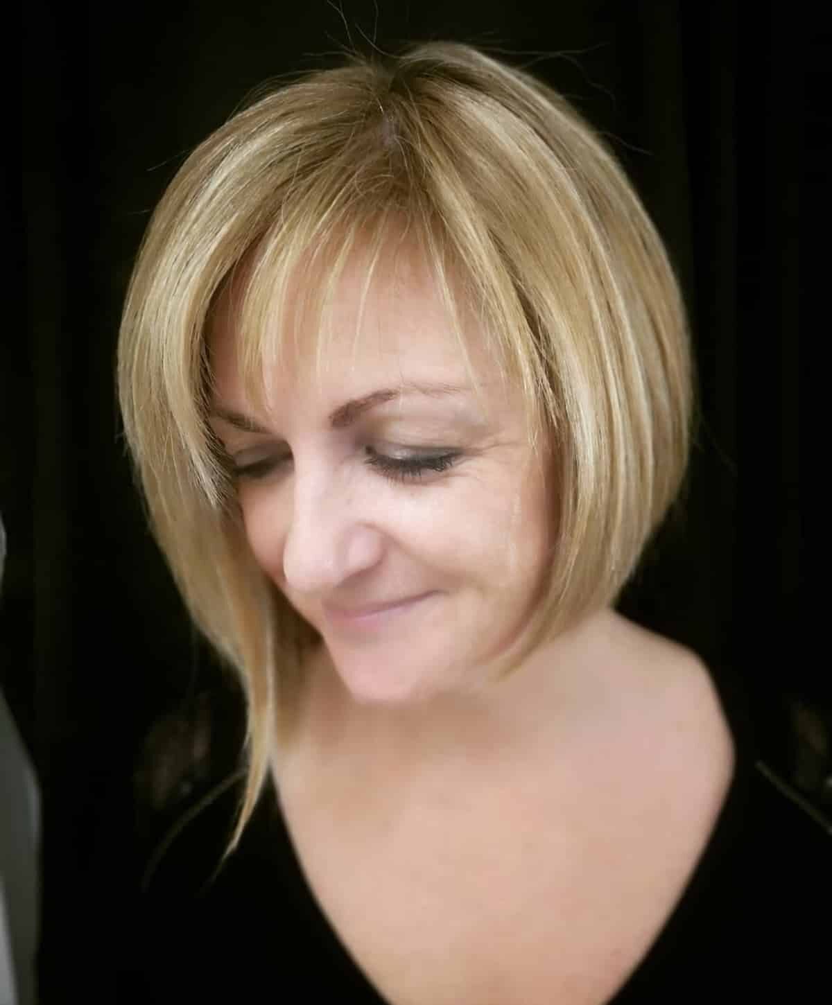 Voluminous Asymmetrical Layered Bob for 60 year olds
