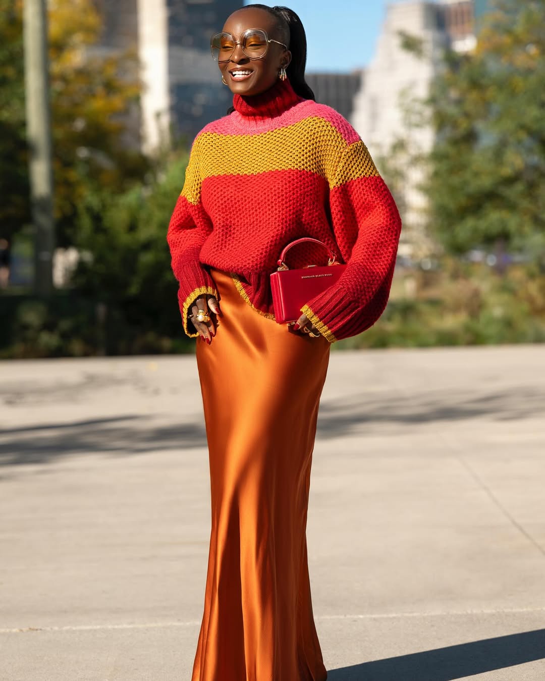 Bold Color Block Sweater With Satin Skirt