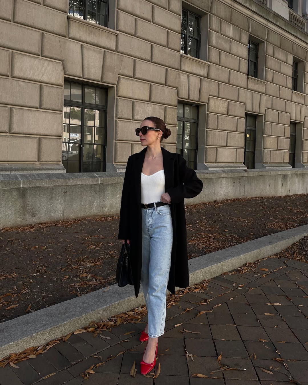 Chic Black Blazer With Light Wash Denim And Red Pumps