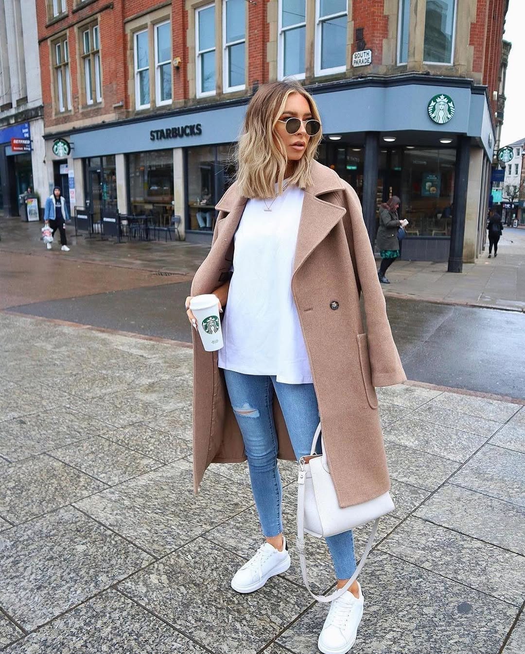 Elevated Casual: Camel Coat With Ripped Jeans