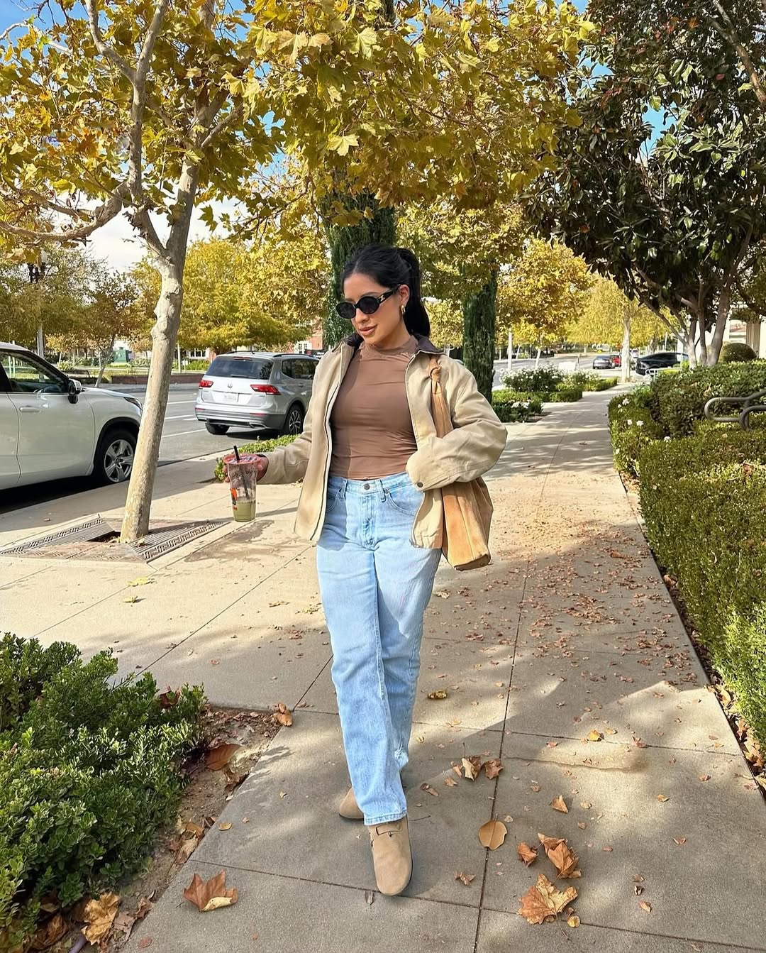 Casual Tan Jacket With Brown Top And Jeans