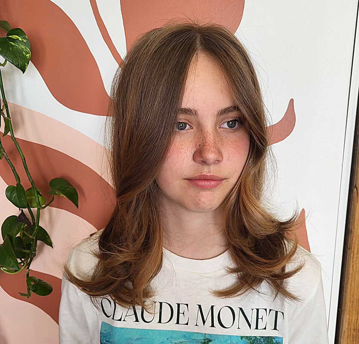 Light brown layered blowout with curtain fringe