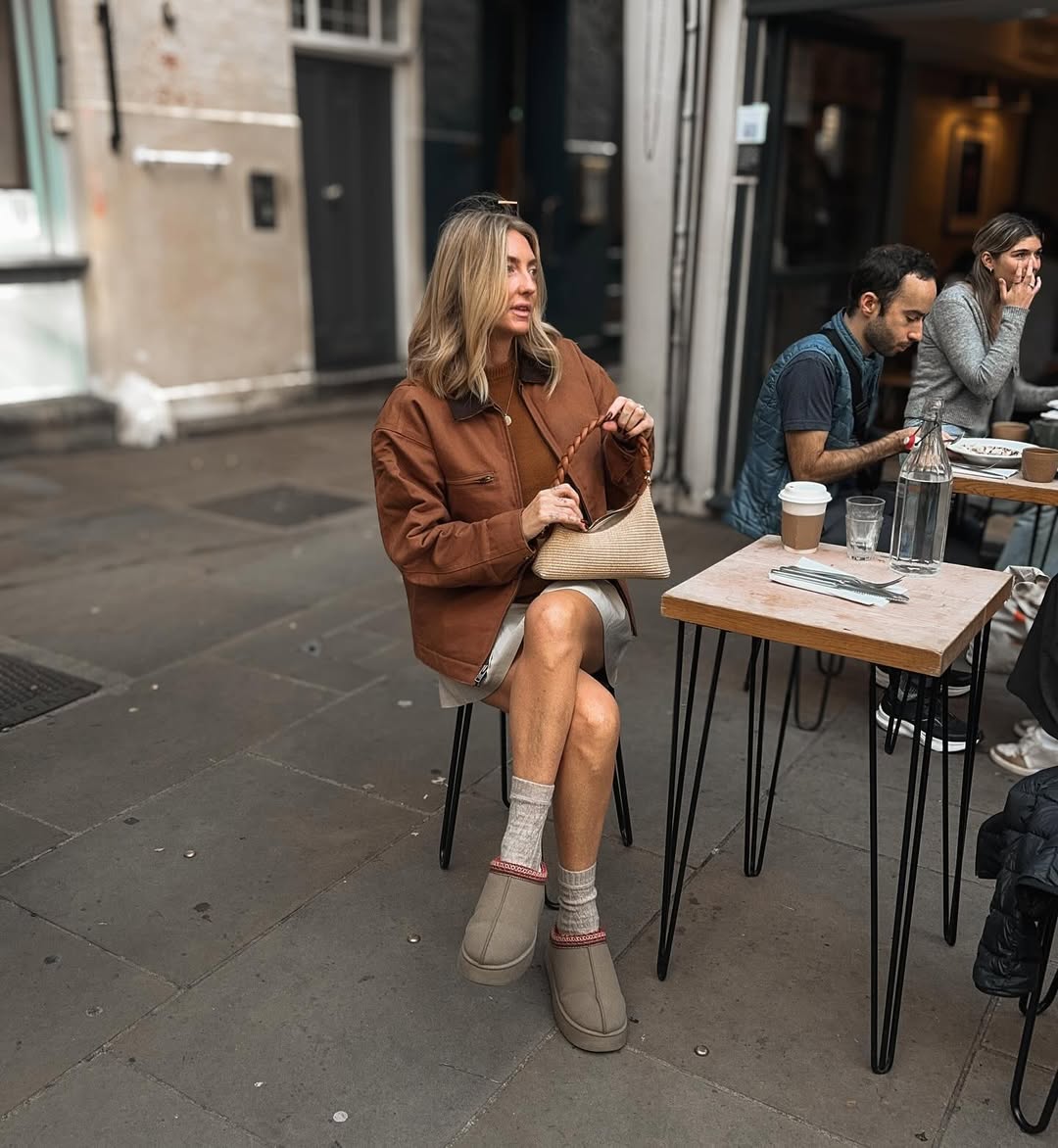 Brown Utility Jacket Over Sweater And Mini Skirt