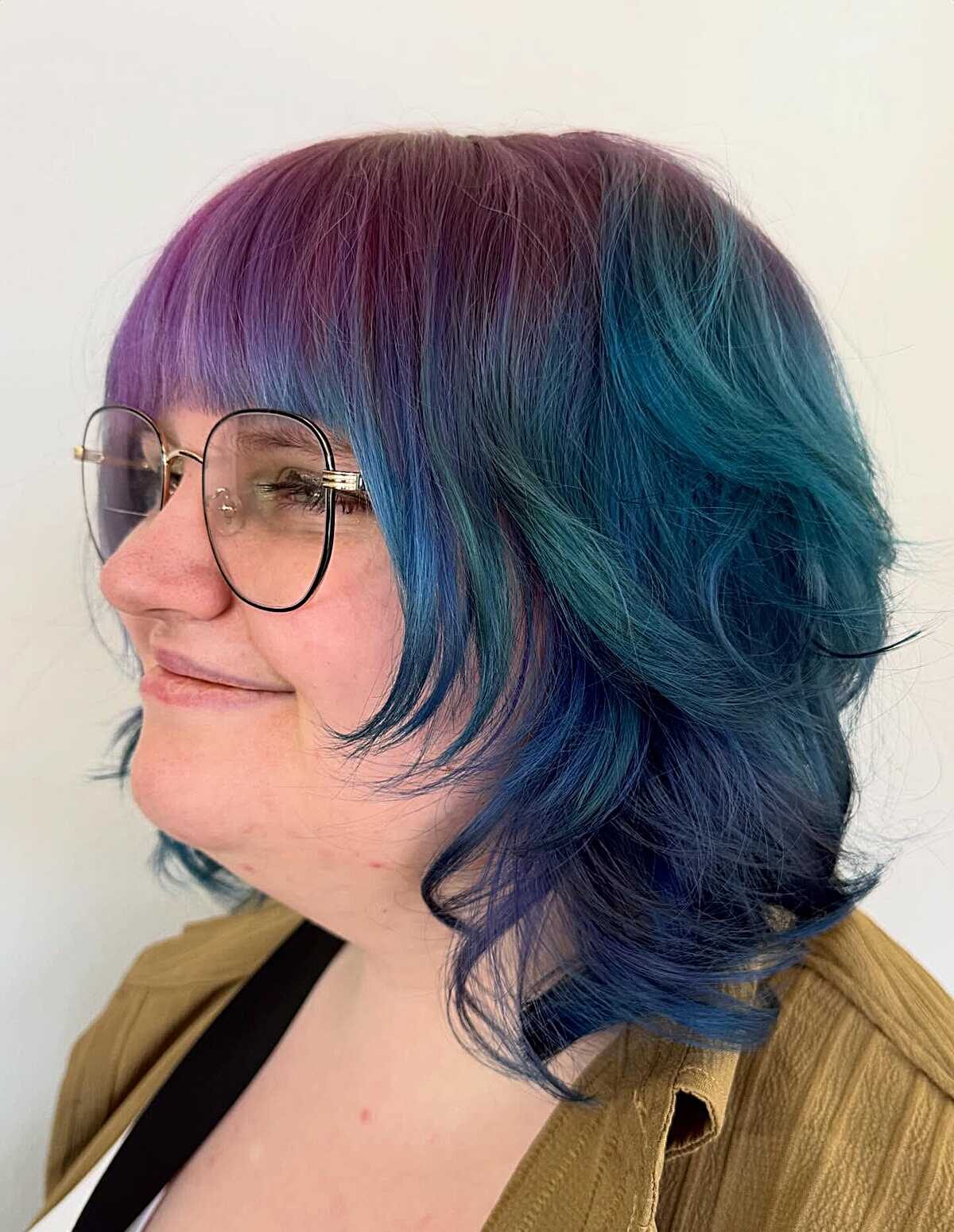 Bob with purple roots fading to teal ends and bangs
