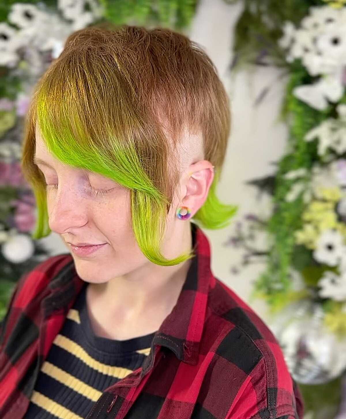 Short copper pixie with neon green tips at the ends