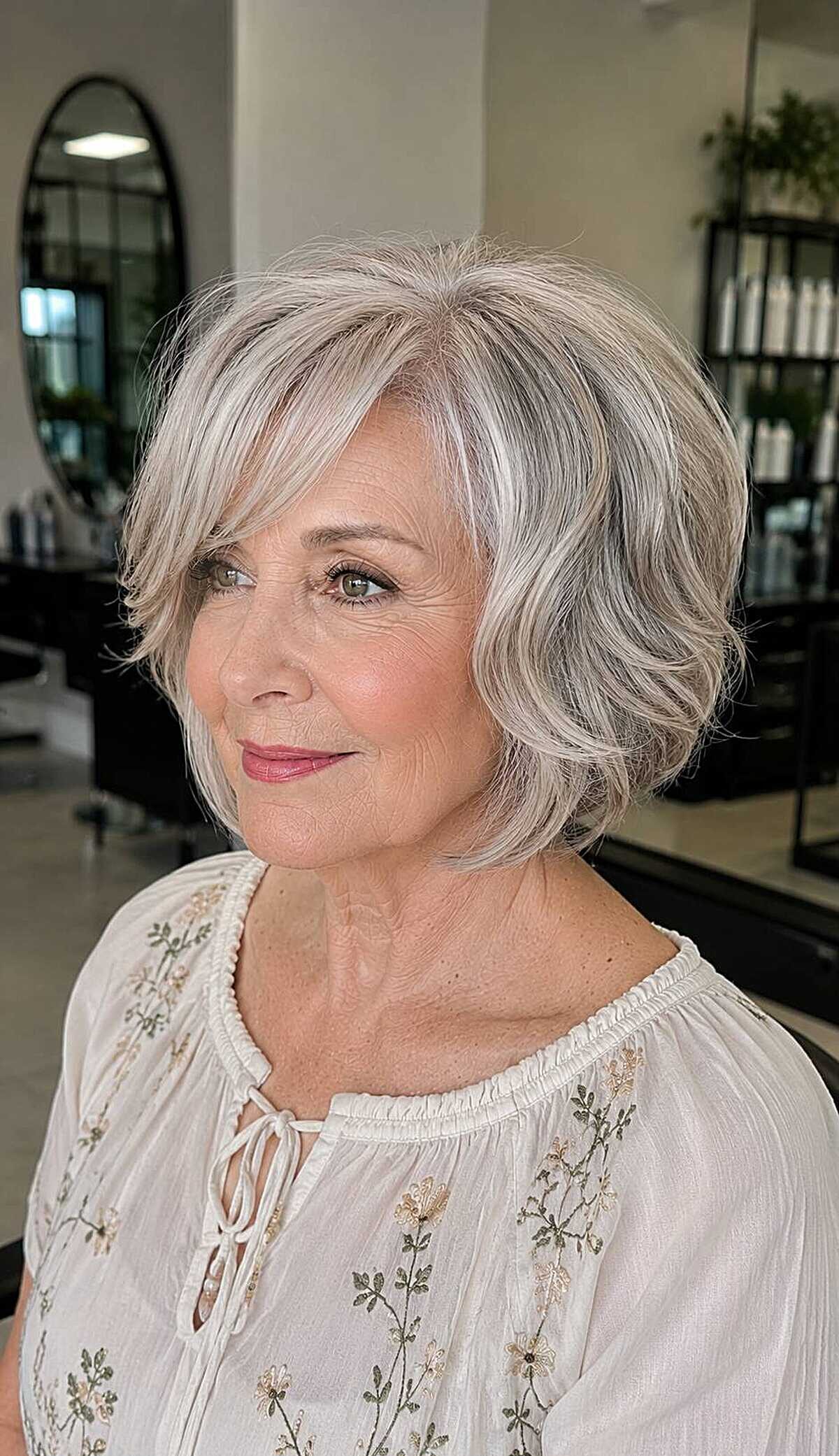 Soft silver wavy bob with piece-y bangs