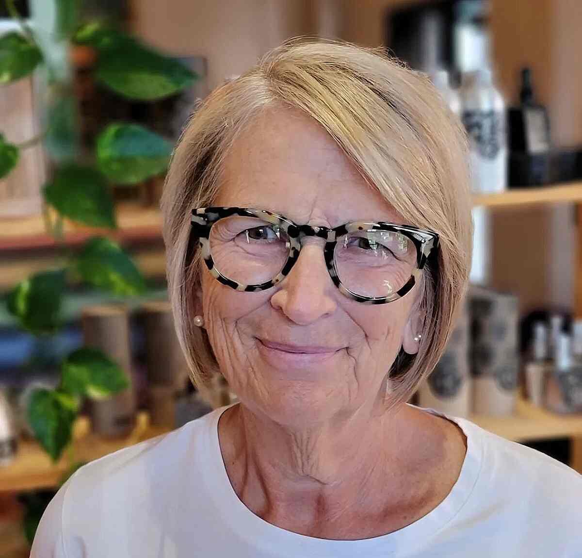 Blonde Short Cut with a Deep Side Part for 70-Year-Olds with Glasses