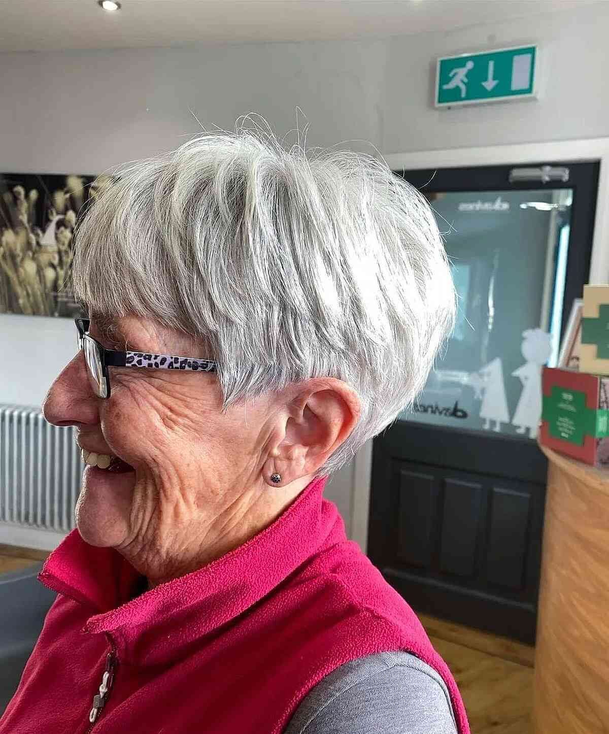 Edgy Pixie for Women Over 70 with Silver Hair and Glasses
