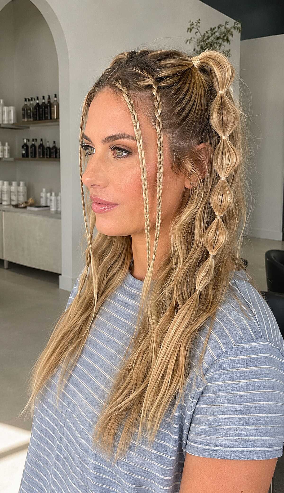 Bubble braid ponytail with thin face-framing braids, blonde