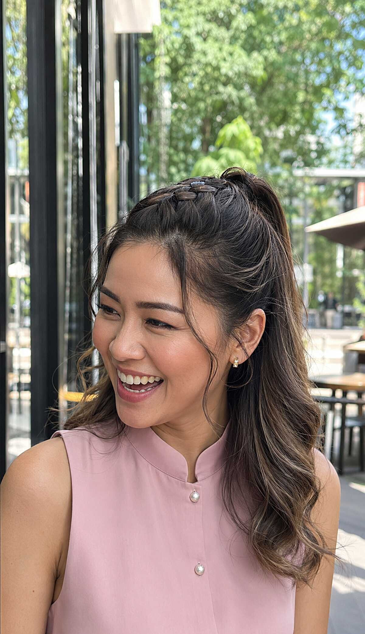 Braided headband ponytail with curtain bangs and curled ends