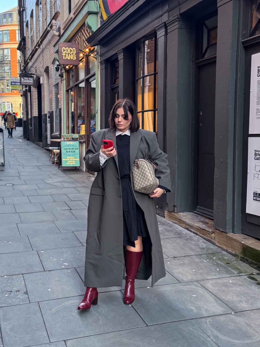 Maxi Trench With Black Mini Dress And Burgundy Boots