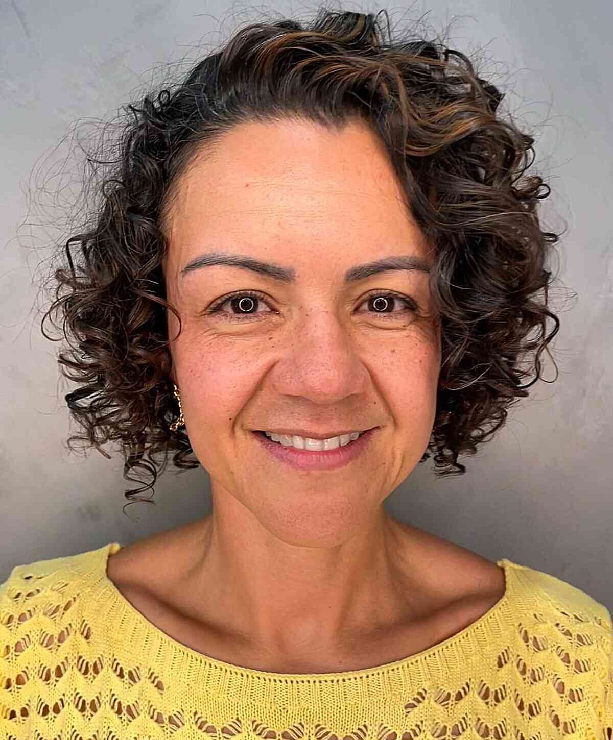 Short Voluminous Curly Bob for Older Women's Brunette Hair