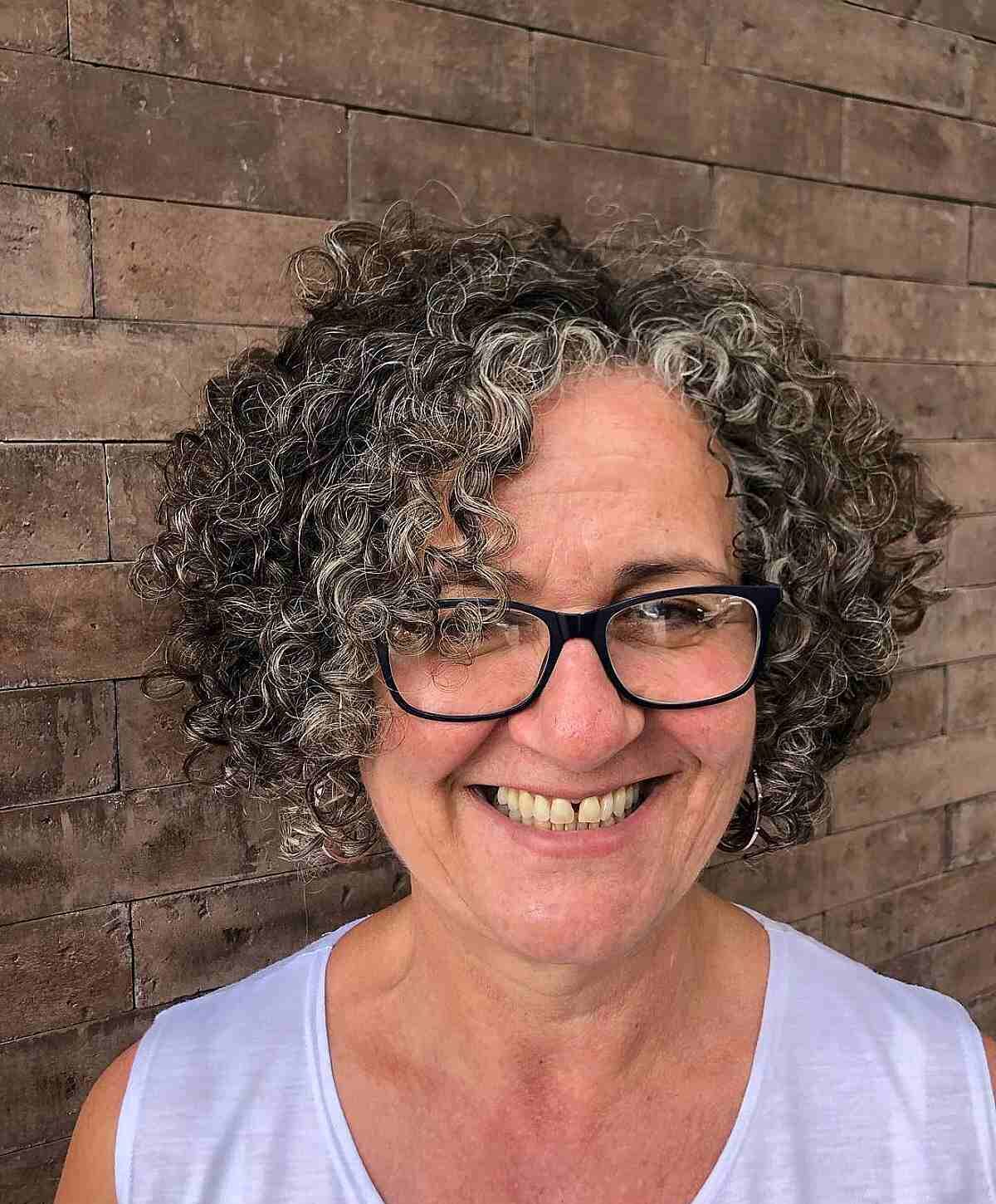 Jaw-Length Soft Tousled Curls and Layers for Older Women with Glasses