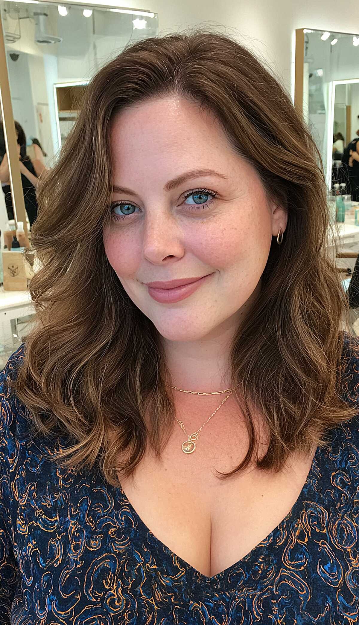 Chocolate brown wavy layered lob on round face