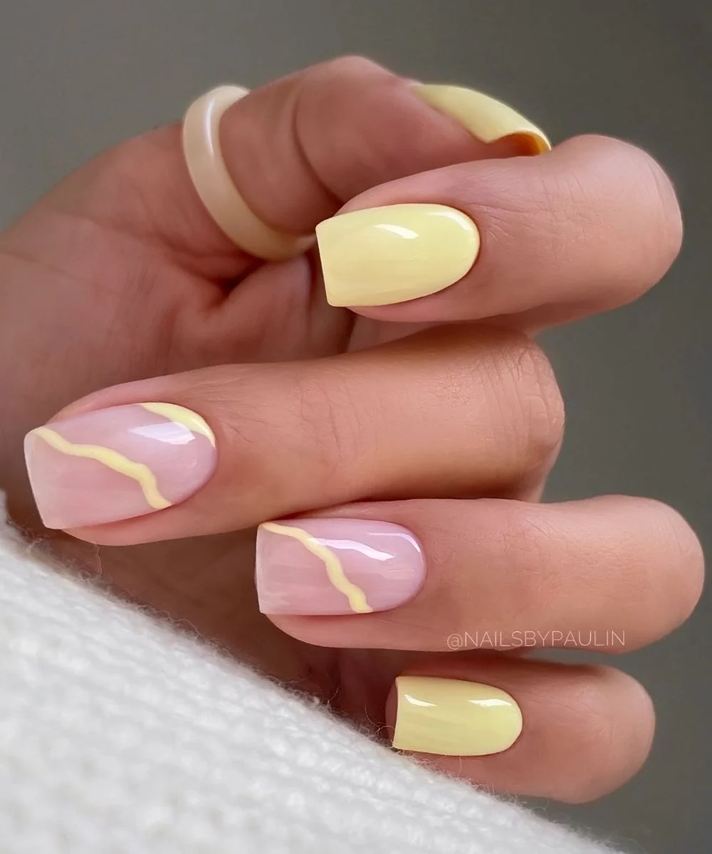 Butter yellow mani with accent line art