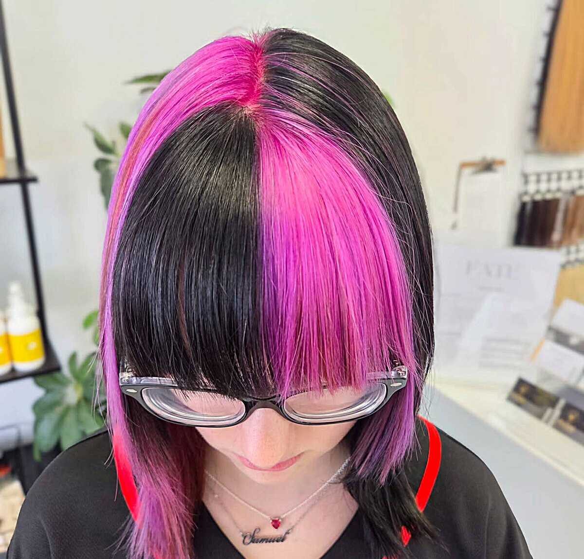 Half pink half black bob with blunt bangs and glasses