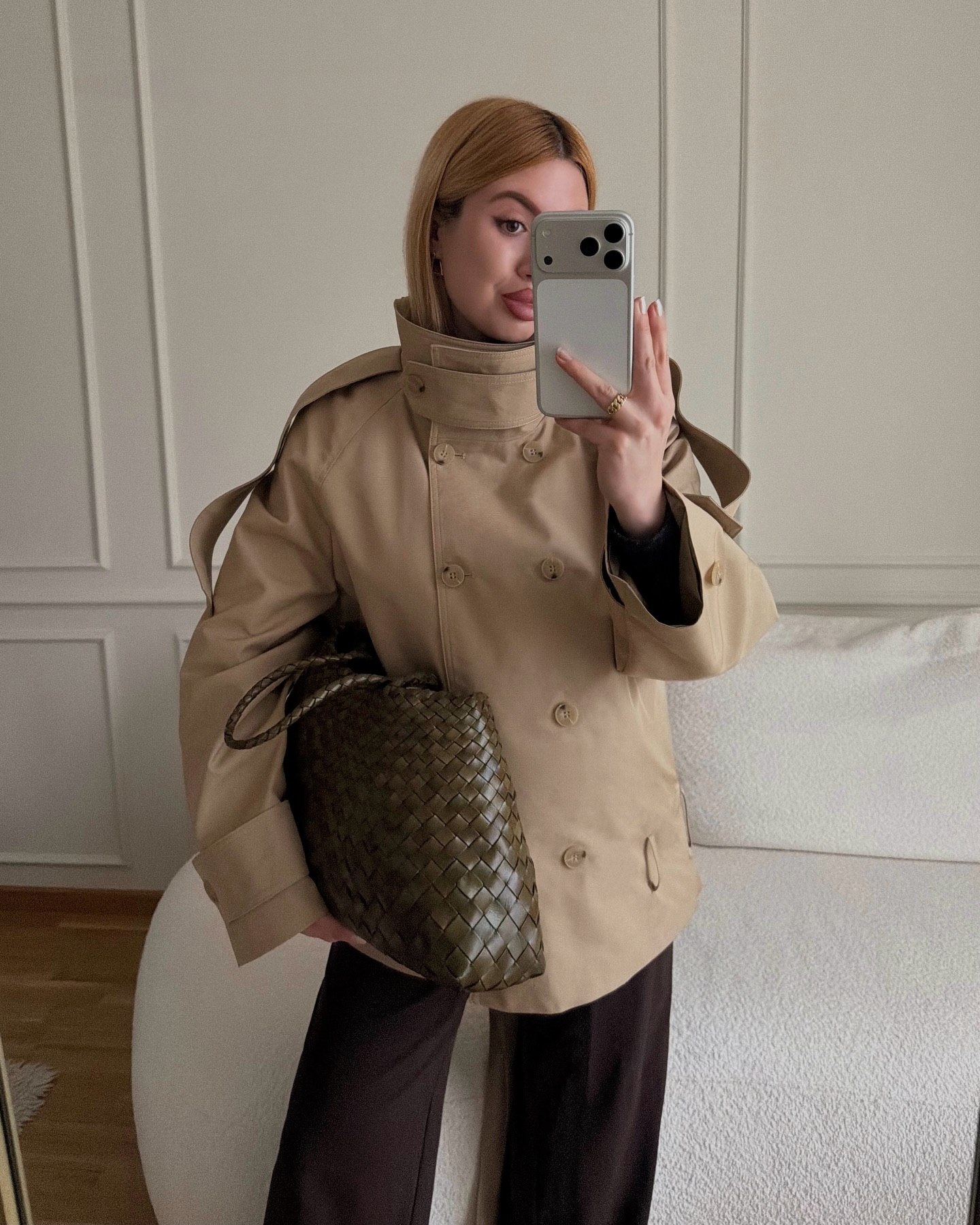 Chic Beige Trench With Dark Trousers And Woven Bag