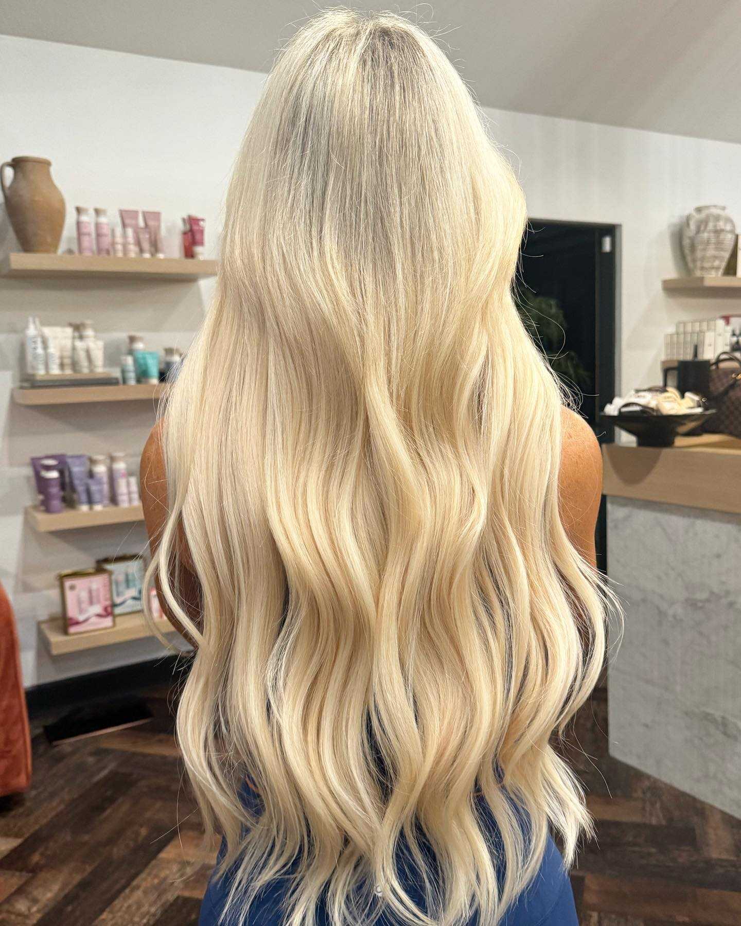 Voluminous Honey Blonde Waves With Face Framing Layers