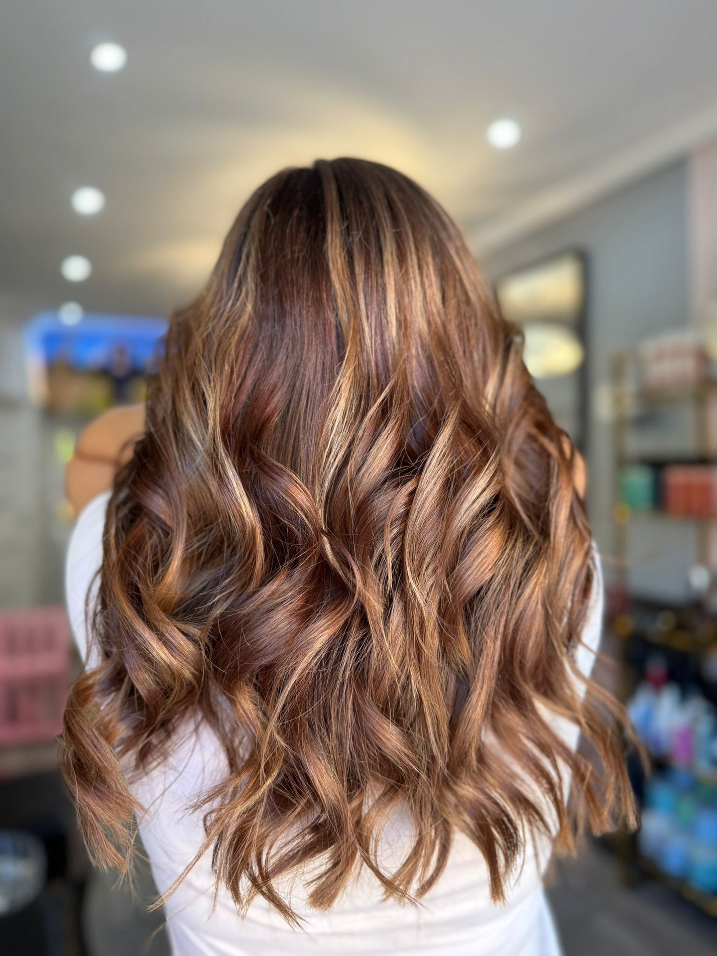 Warm Auburn Balayage With Sunkissed Medium Waves