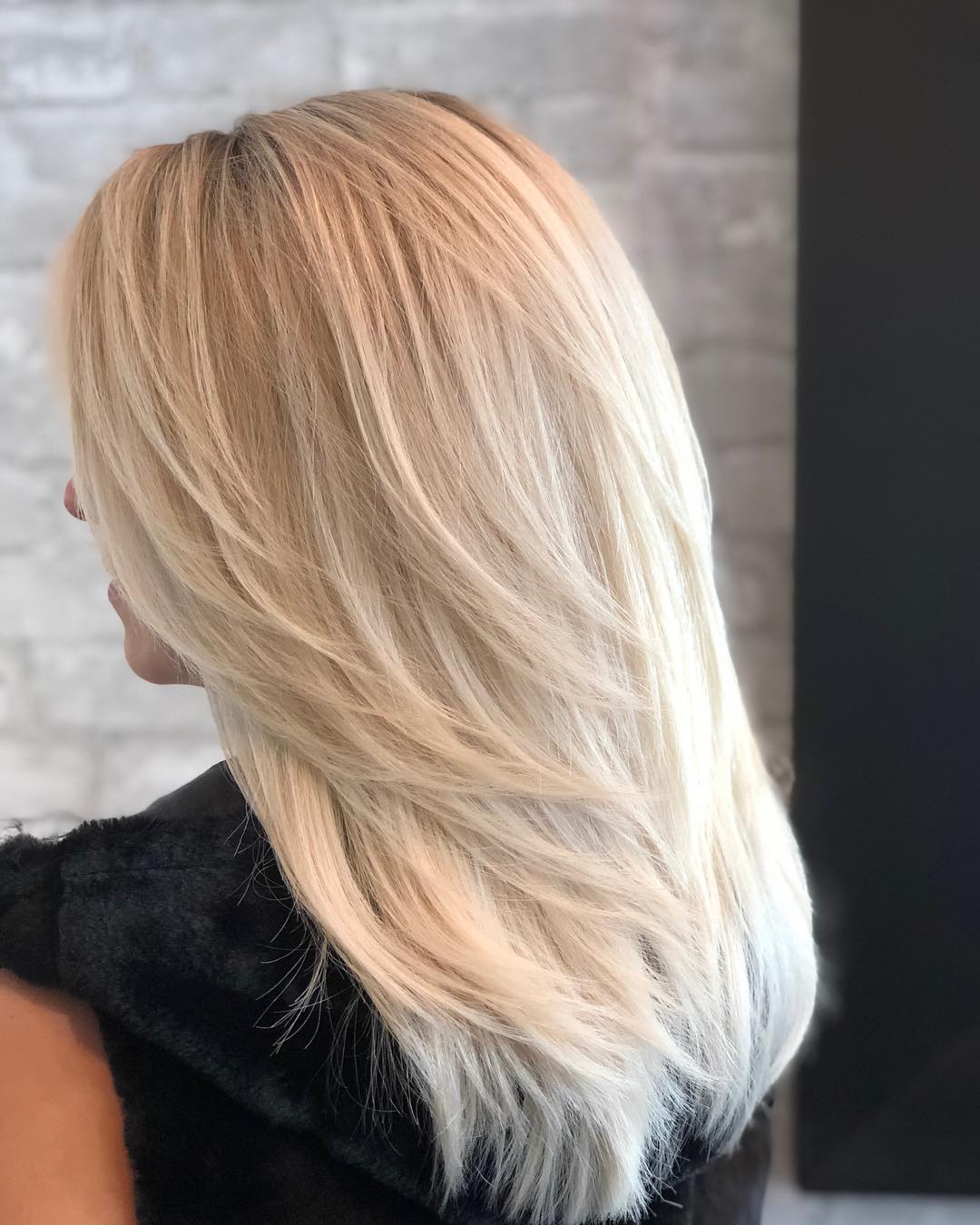 Face-Framing Layers For Golden Blonde Balayage
