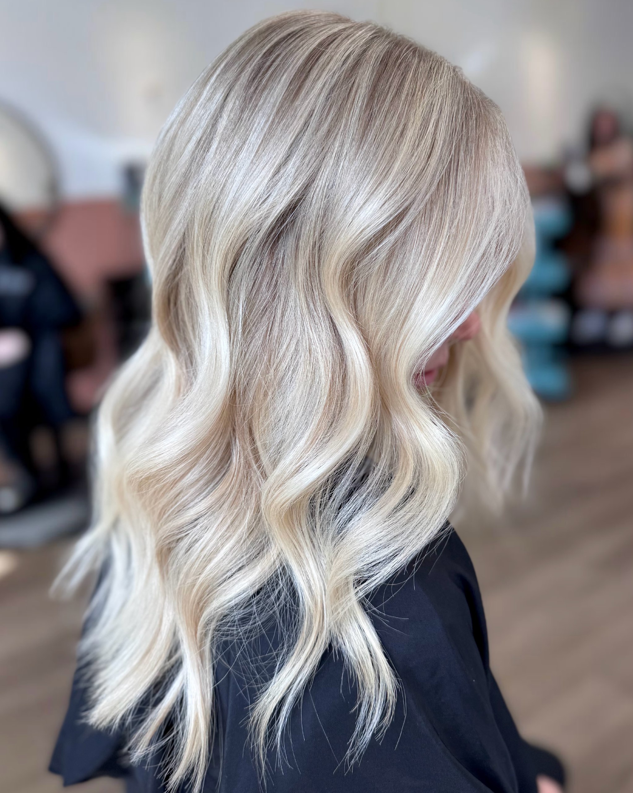 Champagne Blonde Beach Waves With Face Framing Layers