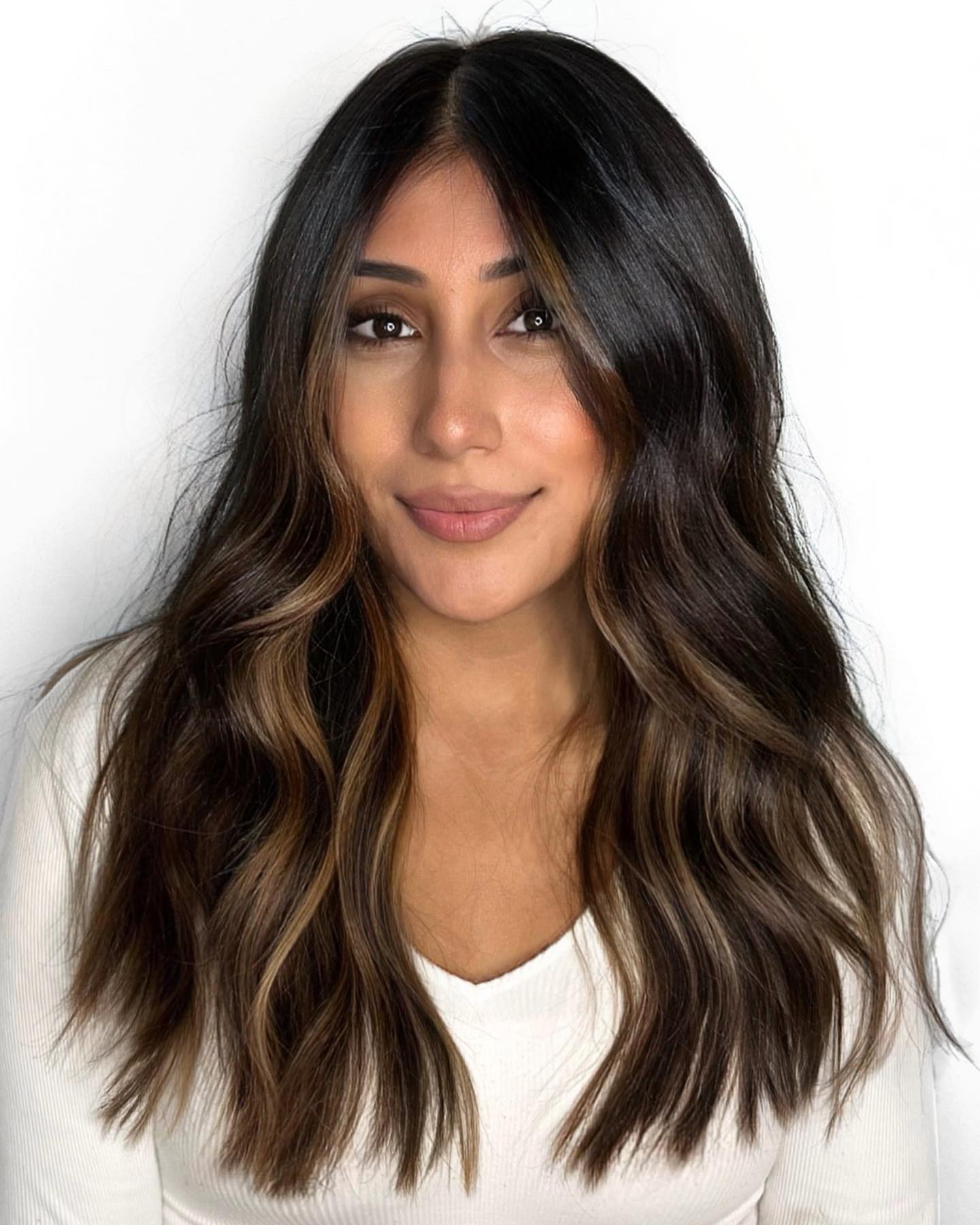 Warm Caramel Balayage On Dark Wavy Hair